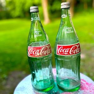 2 : 1 liter glass Coke Cola bottles . Almost perfect condition’